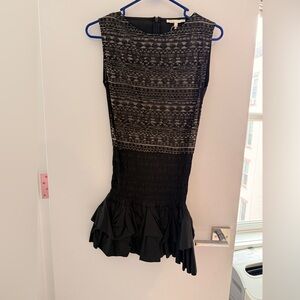 Maje Black lace mini dress with ruffled skirt